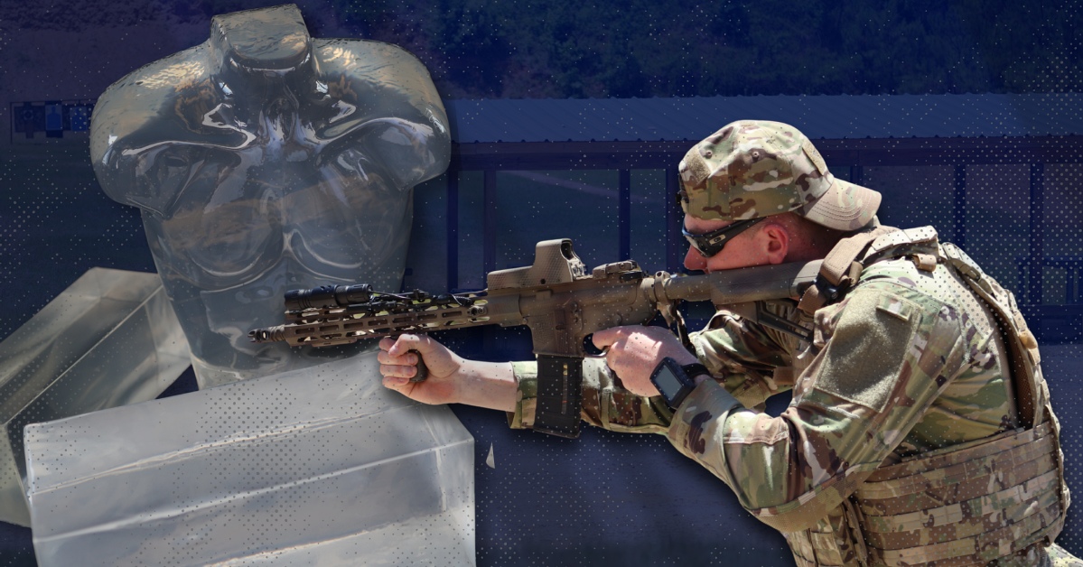Soldier testing rifle with pinned and welded muzzle device using synthetic ballistic gel torso and blocks at outdoor range